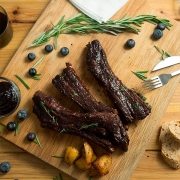 costillas de cerdo con salsa de arándanos