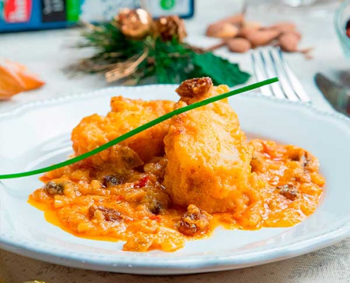 Bacalao con pasas y piñones