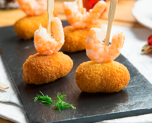 Croquetas de Navidad de bacalao, langostinos y almejas