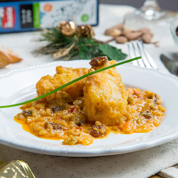 Bacalao con pasas y piñones