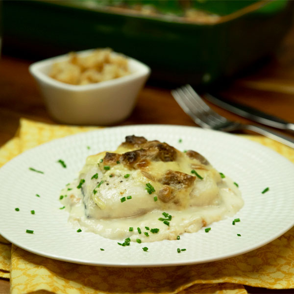 Merluza gratinada con bechamel de puerro