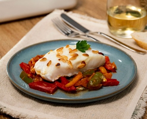 Pimientos guisados con bacalao