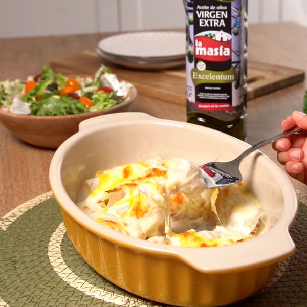 Receta casera de Canelones de puerro rellenos de merluza y gambas