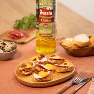 Receta casera de Alcachofas con jamón y huevo de codorniz